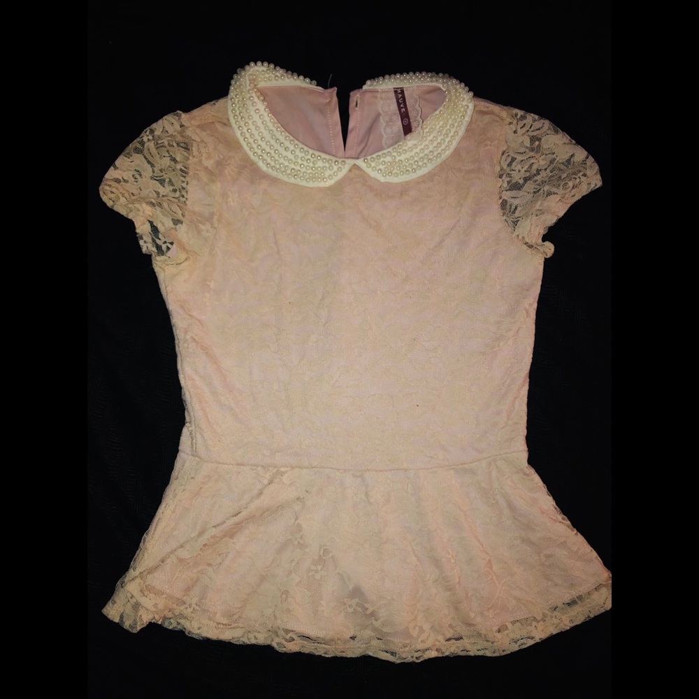 Pink blouse. Pearl Necklace